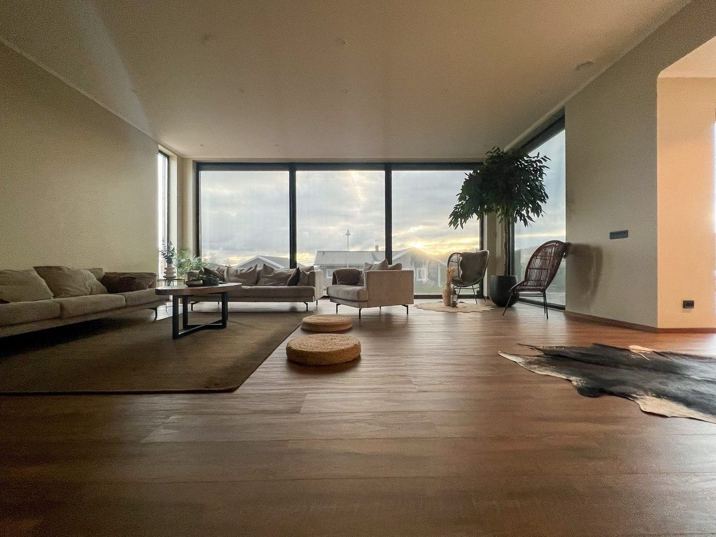 Open living room with a window wall, Uddevalla, enhanced
