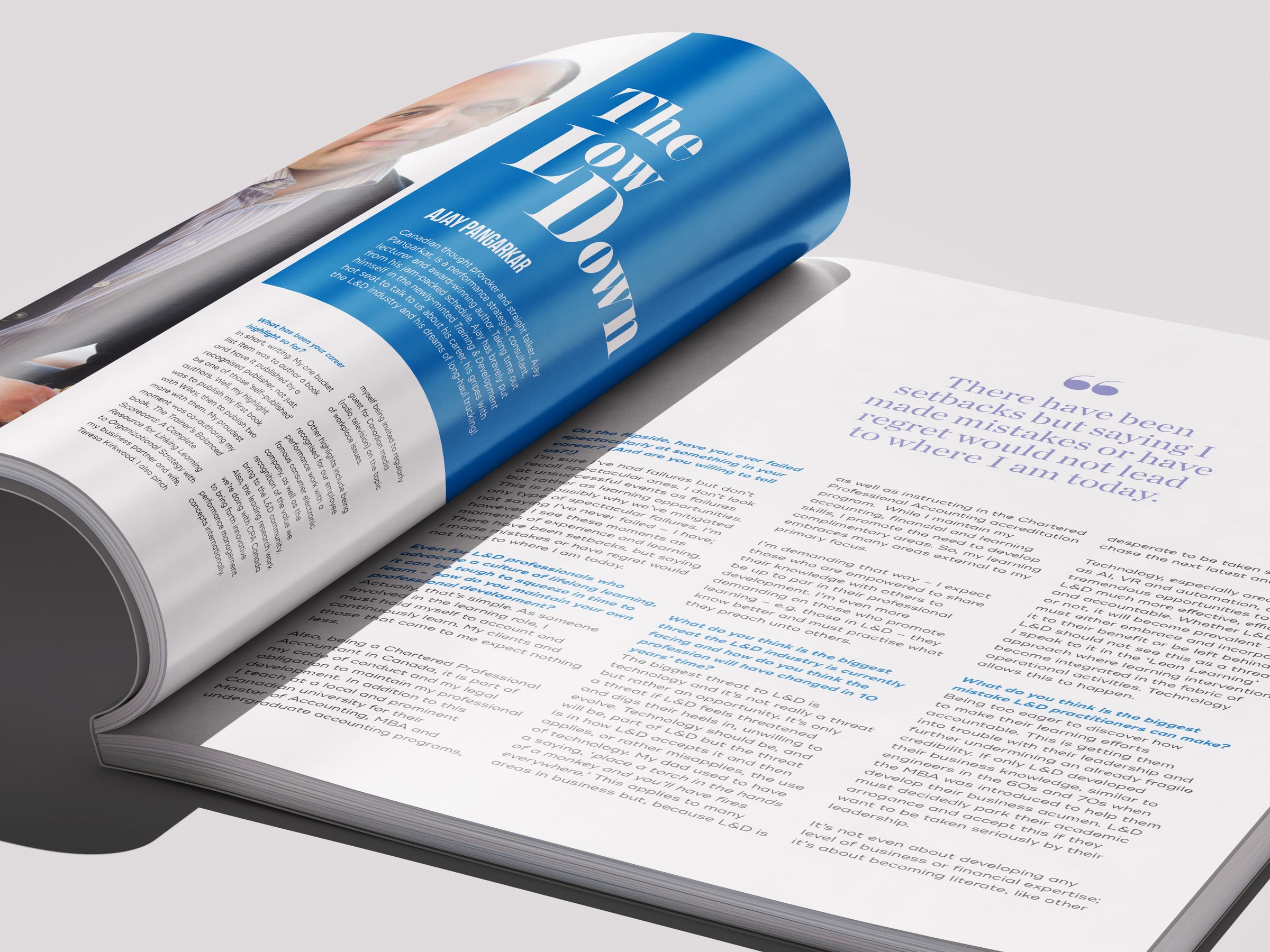 Spread titled The low down, with a blue opener and a large pull quote