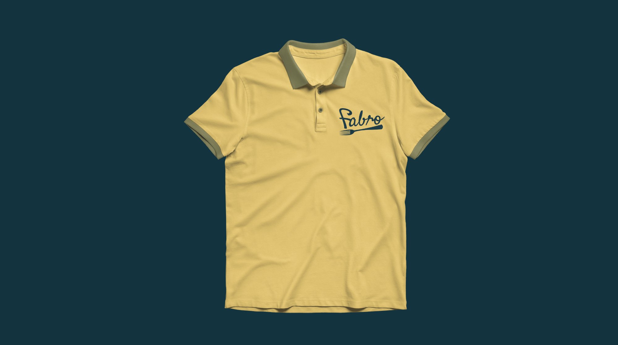 Yellow staff polo shirt with the Fabro logo on the chest