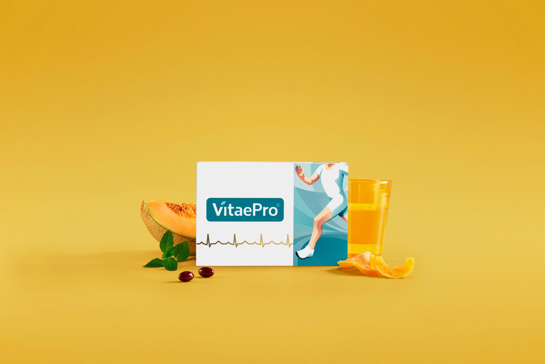 Autumn master: the pack with melon, capsules and a glass of juice on ginger yellow