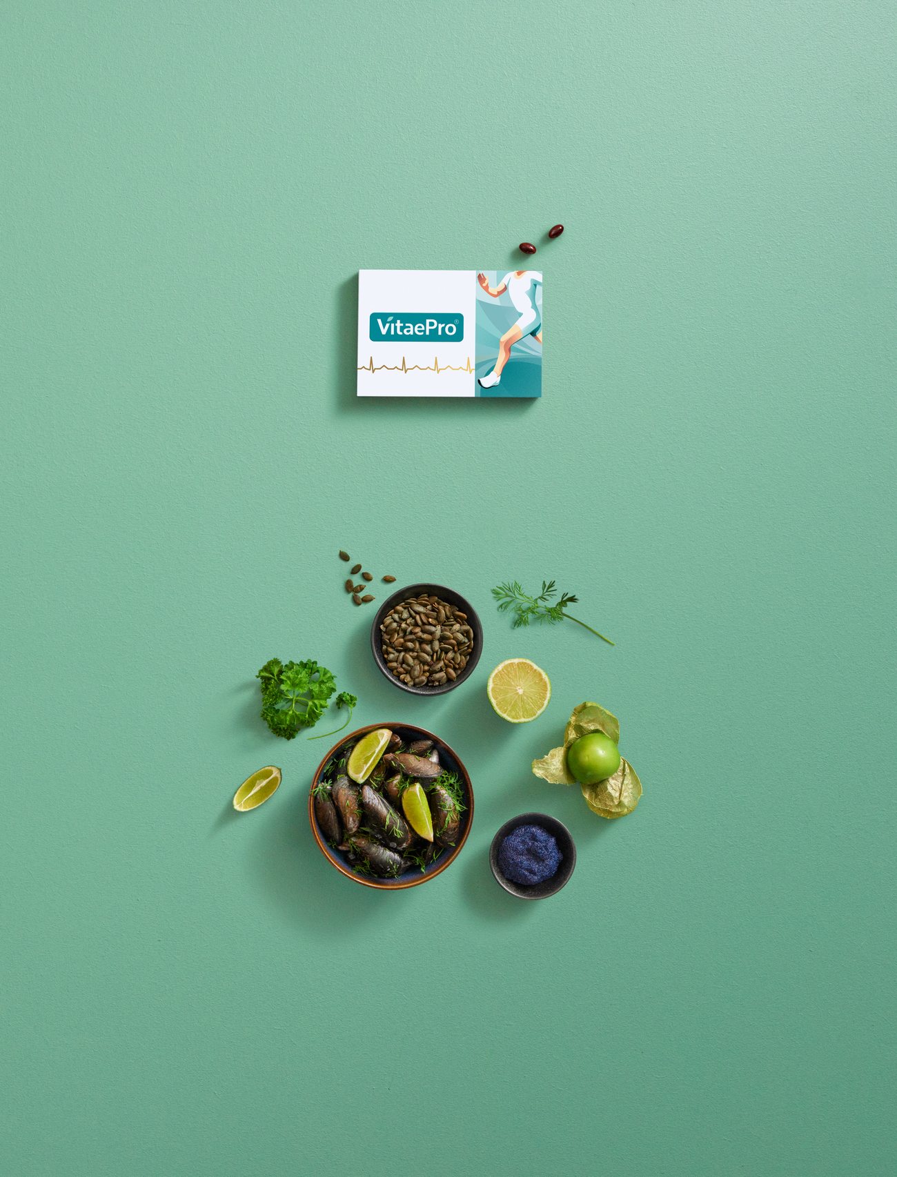 Portrait crop of the sea green master with the pack above a cluster of food props
